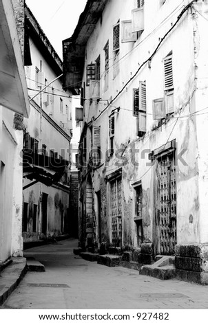 Black and white photo of houses lining Stonetown alleys, Zanzibar Island