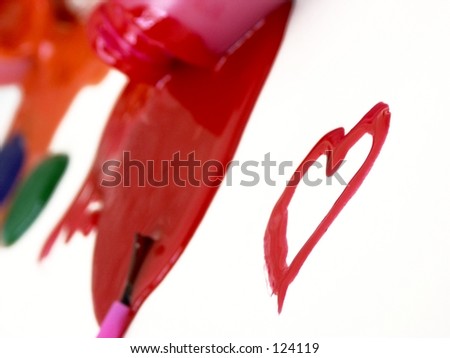 painted heart and red paint spilled