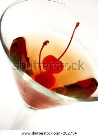 martini with two cherries, shallow dof