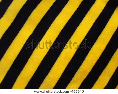 stock photo Fabric of black and yellow striped velvet