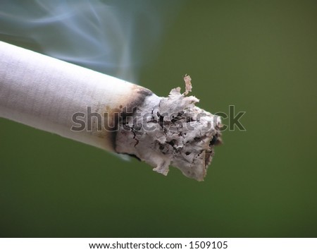 Close-up of end of cigarette with smoke