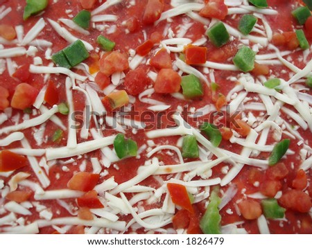 Close-up of frozen pizza as a colourful background