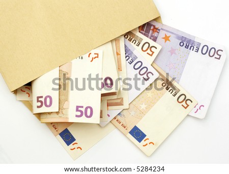 different euro banknotes coming out of an envelope, wealth concept, receiving money