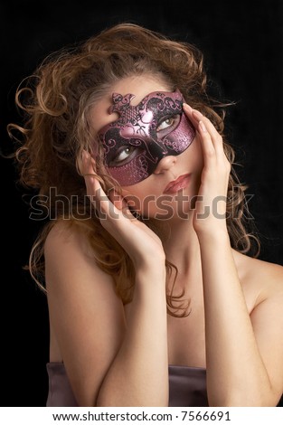 portrait of a mysterious blond young woman with purple shiny carnival mask, role play