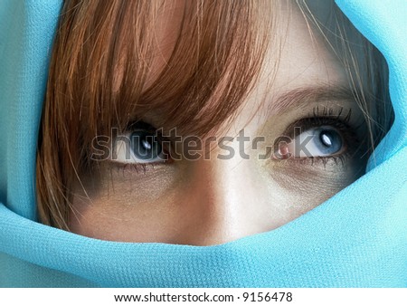 blue eyes, mysterious girl with her face covered by silk blue veil