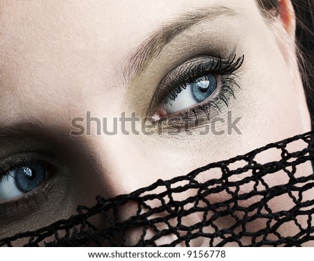 mysterious blue eyes, attractive woman hiding her face under black net veil