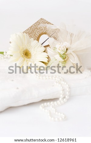 textile wedding background, card pearls  flower, and present