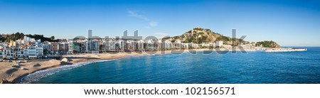Panoramic view of Blanes, with St John Castle on top of the hill and the shoreline in high resolution.