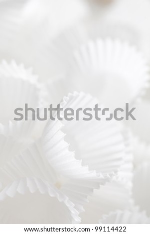 Bunch of cupcake liners with selective focus.