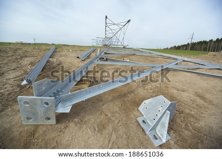 power tower lying on the ground before installation