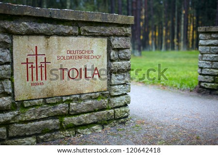 The entrance to the cemetery of German soldiers in Toila, Estonia. Medium shot.