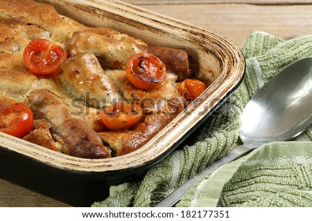 dish of home made toad in the hole sausage batter
