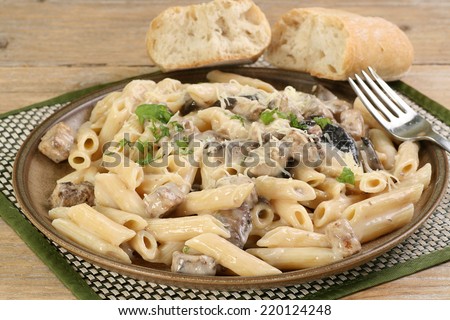 home cooked chicken and mushroom with pasta in a creamy mushroom sauce