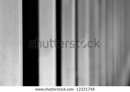 abstract repeating pattern of stepped bars disappearing into the distance
