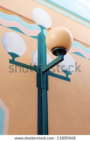 Art deco light on a painted art deco wall