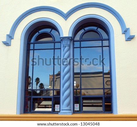 Art Deco Buildings reflected in an art deco window