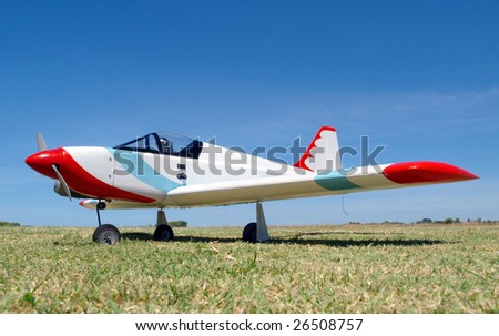 A Radio Control Aircraft parked on the grass