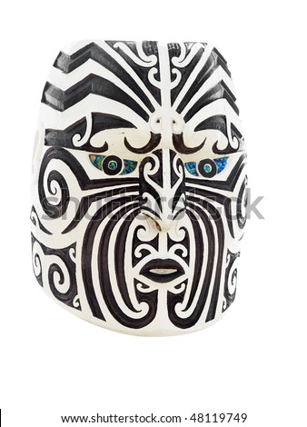 stock photo Wooden Maori Face with Traditional Moko or Tattoo
