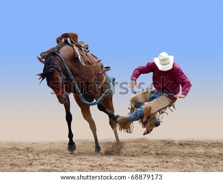 Cowboy bucked of a bucking Bronco isolated with path