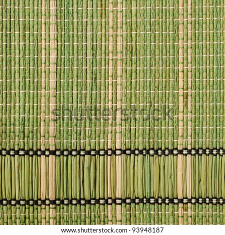 Texture of traditional straw table mat from bonded bamboo