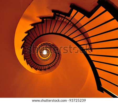 Colored Spiral stairway of an old building in Milan/Into the light