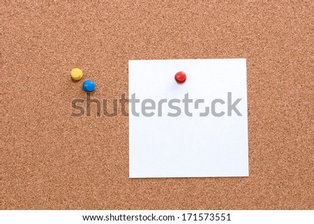 Cork board with a piece of paper