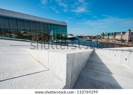 OSLO - AUGUST 13: Oslo Opera House on August 13, 2012 in Oslo, Norway. The Oslo Opera House is the home of The Norwegian National Opera and Ballet, and the National Opera Theatre.