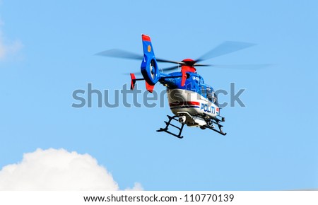 OSLO, NORWAY - AUGUST 15: Police (politi) helicopter performing test flights above Oslo on August 15, 2012.