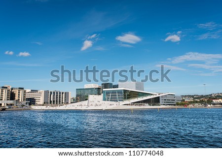 OSLO - AUGUST 11: Oslo Opera House on August 11, 2012 in Oslo, Norway. The Oslo Opera House is the home of The Norwegian National Opera and Ballet, and the National Opera Theatre.