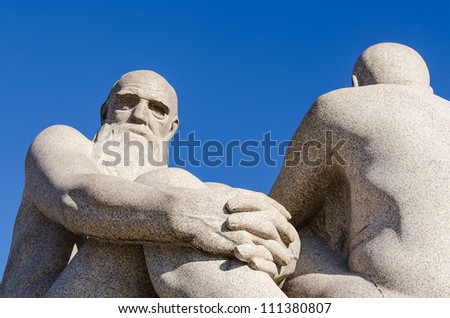 OSLO, NORWAY - JUNE 21: Statues in Vigeland park in Oslo, Norway on JUNE 21, 2012.The park covers 80 acres and features 212 bronze and granite sculptures created by Gustav Vigeland.