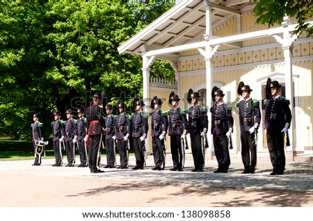 OSLO - MAY 23: In Oslo, His Majesty King\'s Guard keeps The Royal Palace and Royal Family guarded 24 hours day. Every day at 1330 hrs, there is Change of Guards outside Palace. Pictured on May 23, 2012