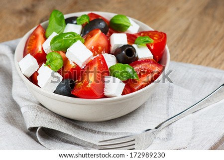 Greek salad in bowl close up
