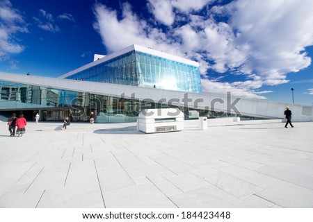 OSLO, NORWAY - SEPTEMBER 5: National Oslo Opera House shines at sunrise on September 5, 2012. Oslo Opera House was opened on April 12, 2008 in Oslo, Norway