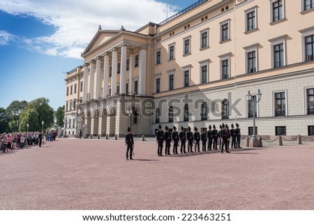 OSLO - AUGUST 28: In Oslo, His Majesty King\'s Guard keeps The Royal Palace and Royal Family guarded 24 hours day. Every day at 1330 hrs, is Change of Guards outside Palace. Pictured on August 28, 2014