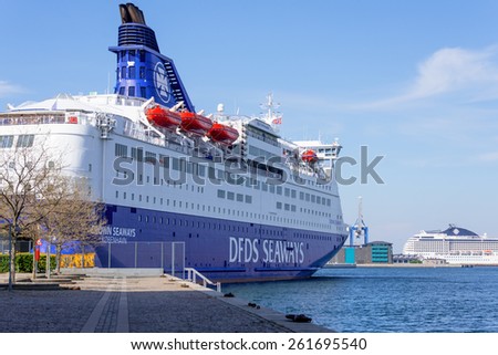 COPENHAGEN, DENMARK - MAY 18: DFDS ship CROWN SEAWAYS in Copenhagen harbour on MAY 18, 2013 DFDS SEAWAYS is Northern Europe\'s largest shipping and logistics company.