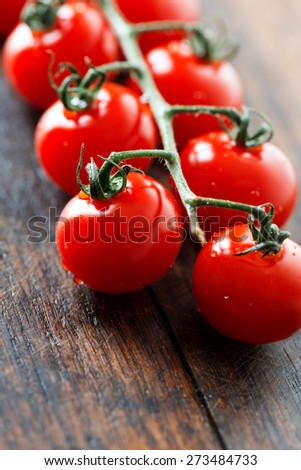 Vein tomato on wooden table