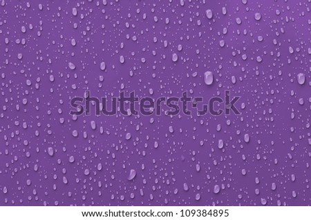 Water Droplets on Pink metallic Surface