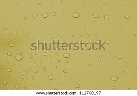 Water droplets on a clean surface.