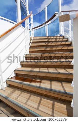 Wooden Stairs up on sundeck of the cruise ship on sunny day. See my other cruise ship interior and exterior images.