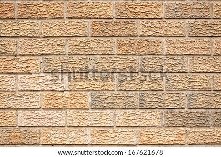 Red brick wall surface pattern as a wallpaper concept for designers background applying