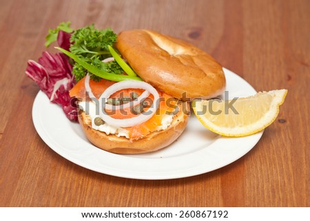 Salmon Bagel Sandwich on white plate