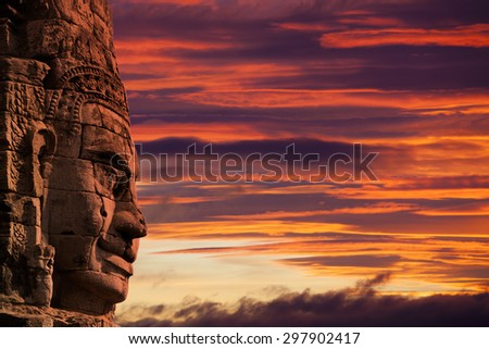 Profile face sculpture of king Jayavarman VII (others believe it\'s the bodhisattva of compassion called Avalokitesvara or Lokesvara) at The Bayon Temple, Angkor Wat, Combodia