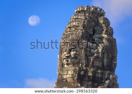 Ancient stone faces of king Jayavarman VII at The Bayon temple, Angkor, Cambodia