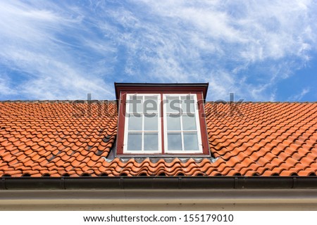 Dormer windows and red tiled roof