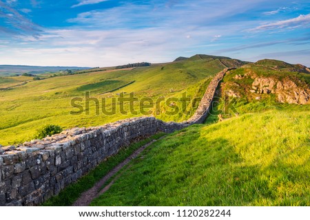 Roman Wall near Caw Gap, or Hadrian\'s Wall, a World Heritage Site in the beautiful Northumberland National Park. Popular with walkers along the Hadrian\'s Wall Path and Pennine Way