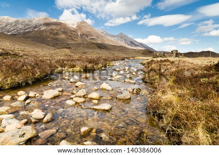 Mountain stream from Beinn Eighe / Rocky mountain stream flows from the Beinn Eighe range