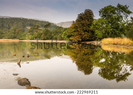 Coniston Water reflections / Coniston Water is the third largest lake in the district at about five miles long