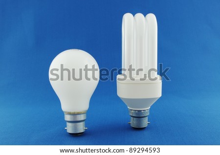 Traditional & Energy Saving Light Bulbs / Showing the difference between traditional and energy saving bulbs