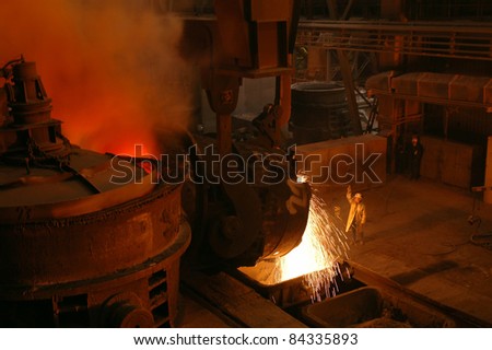 Casting of hot iron in foundry 1