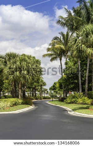 Road to gated community buildings in Naples, Florida
